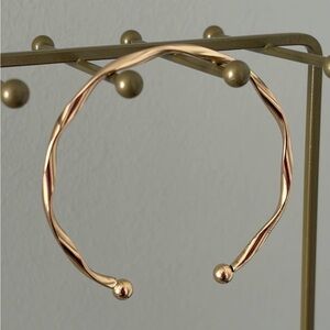 Elegant Gold-Toned Twisted Bangle Bracelet